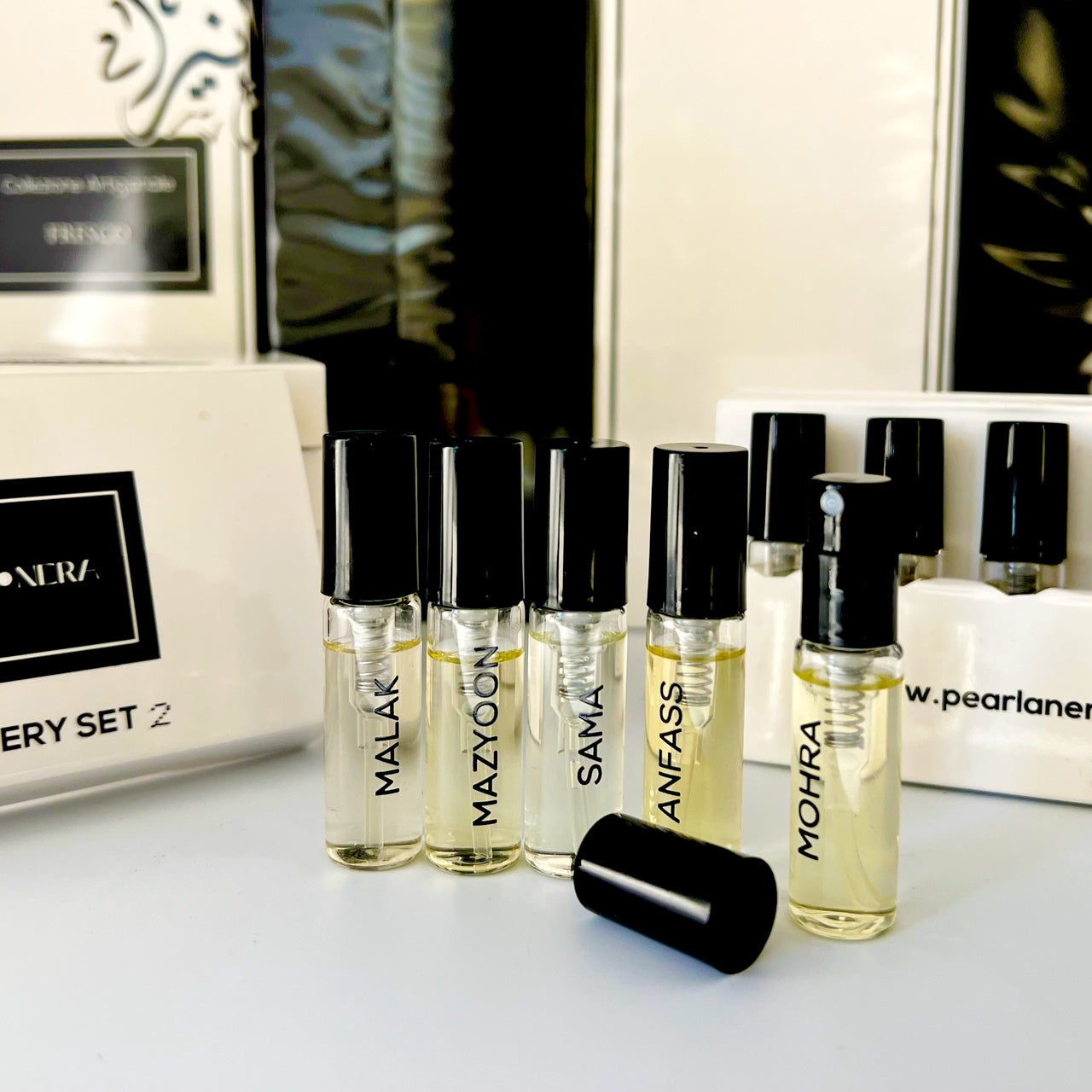 PEARLANERA is bringing the art of browsing to life by sending "discovery sets" directly to your door. Each is filled with a collection of sample-size scents —  five —that are far more substantial than typical single-spray testers.